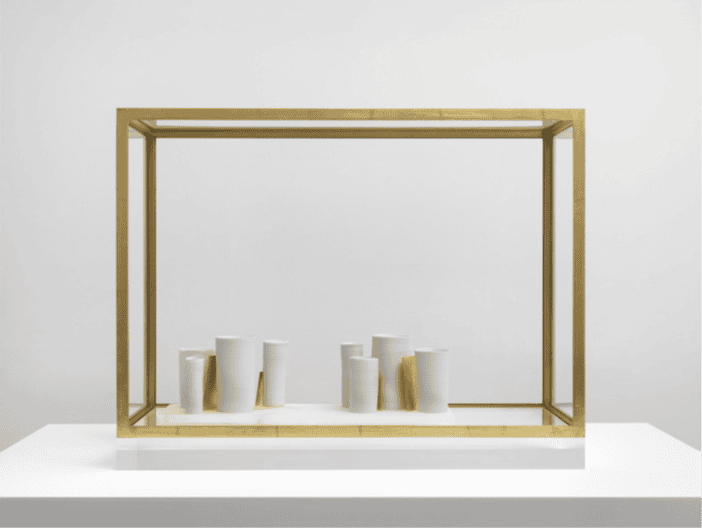 display of pots in a vitrine