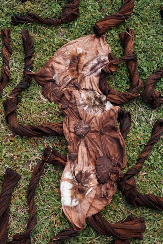 Weiyi Chen, Recoding time, 2024. dioscorea cirrhosa root dye on handwoven cotton fabric, Rock, 80 x 30 cm, 2024 Photograph by Xinyue Tao