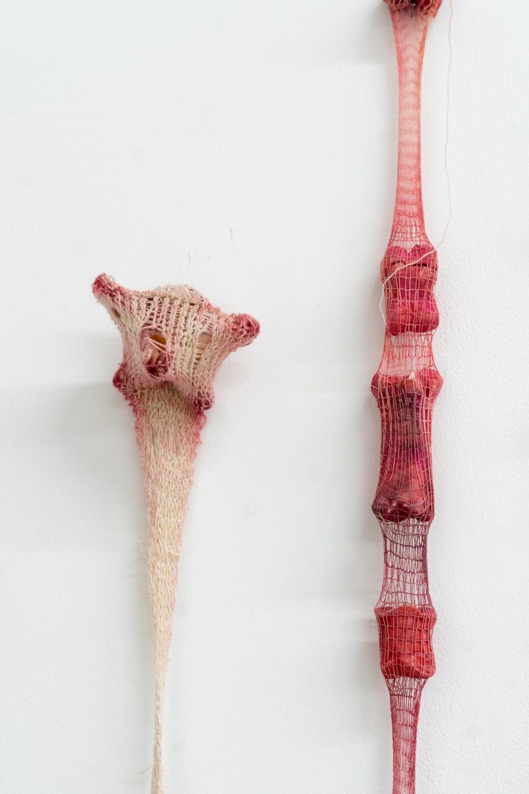 Weiyi Chen, Leftovers, 2025. Ox tail, pig feet bones, hand-spun cotton yarn, pastel, Size variable.