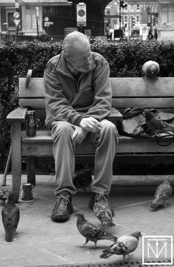poor man on bench by Carl